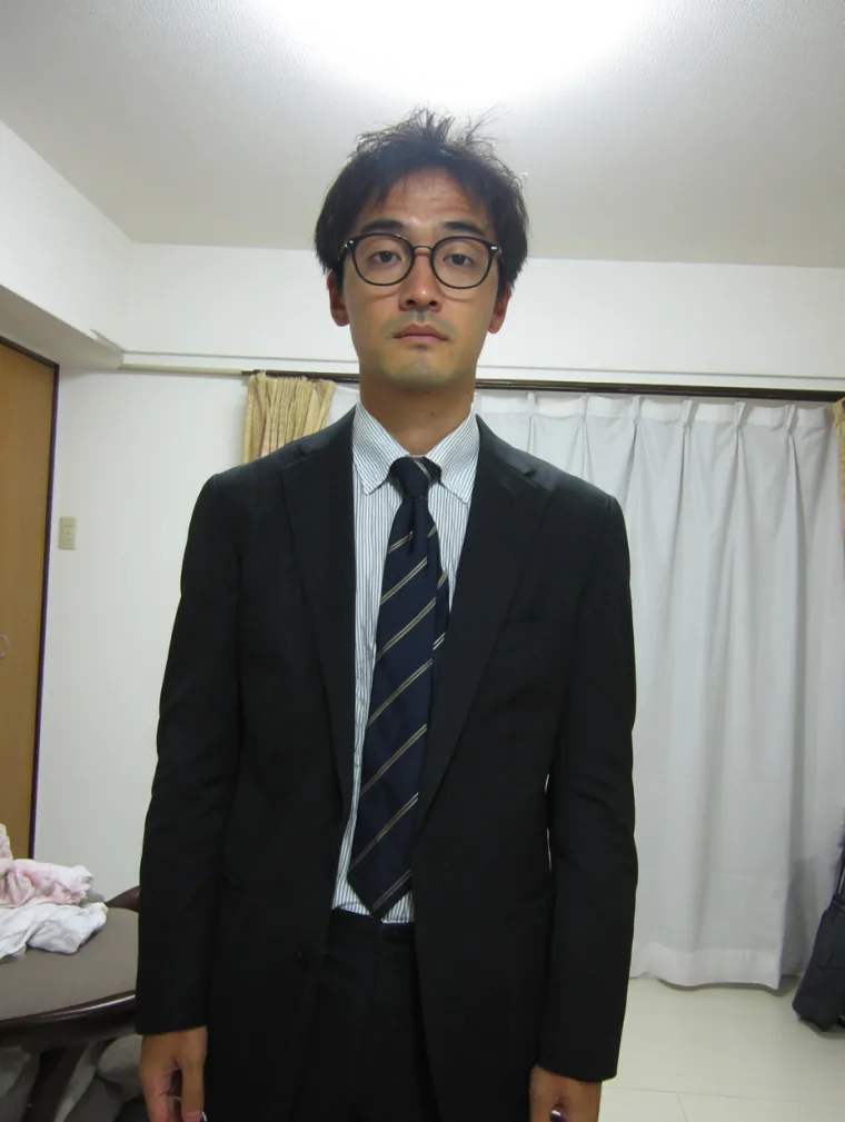 外見コンサル前の男性の写真